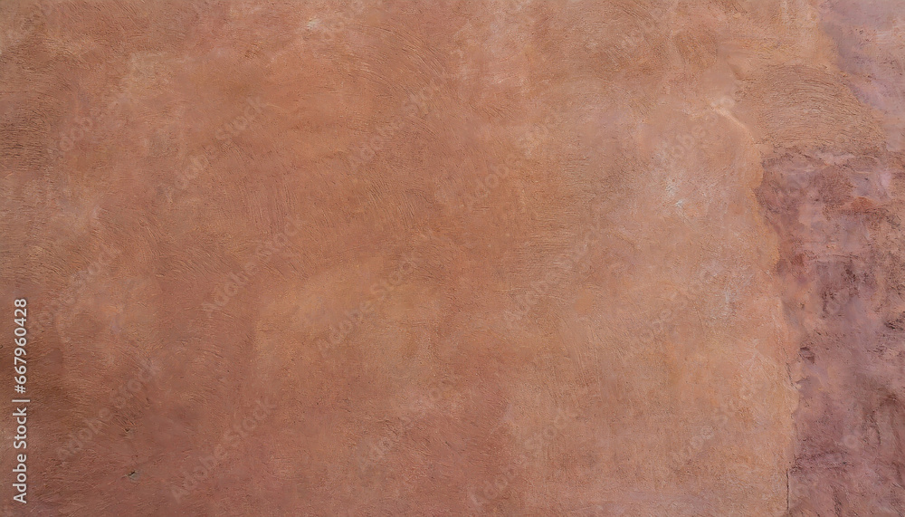 Naklejka premium Abstract background of an exterior reddish brown adobe style textured wall surface
