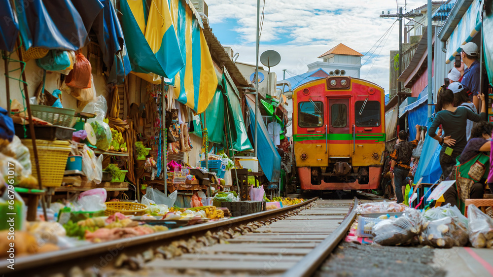 Naklejka premium Maeklong Railway Market Thailand, Maeklong Railway Market with train thailand
