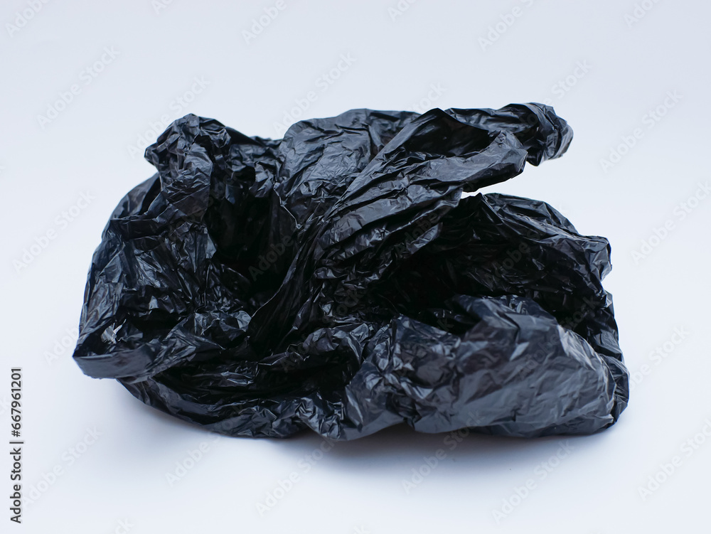 black plastic bag trash isolated on white