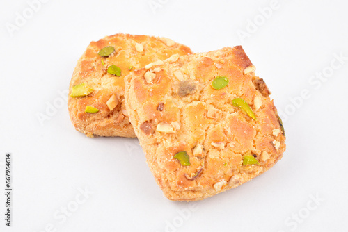 Closeup of baked biscuit isolated on white background