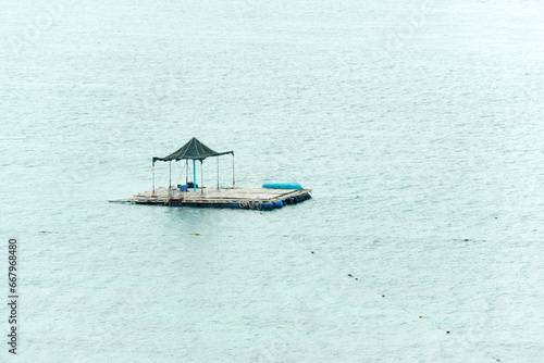 raft in the middle of the sea in the end of summer day 