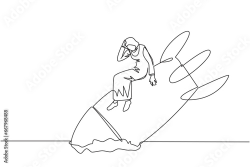 Single one line drawing Arabian businesswoman sits downcast on swooping rocket stranded and stuck at ground level. New business was destroyed. Unable to pay bills. Continuous line graphic illustration