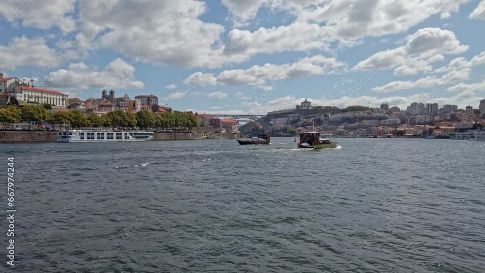 View of the douro river with tourist boats sailing, landscape. Oporto, Portugal View of the douro river with tourist boats sailing, landscape. Oporto, Portugal
