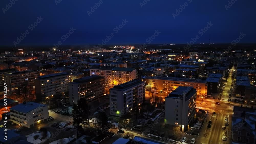 Aerial view around condos and illuminated streets of Vaasa, dusk in Finland Aerial view around condos and illuminated streets of Vaasa, dusk in Finland
