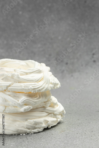 Large meringue Pavlova cake. Baking at home, vertical image. top view. place for text