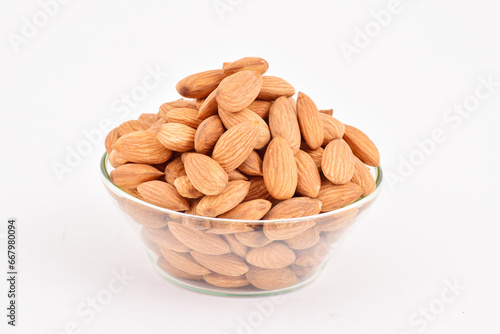 Bowl of almond on white background