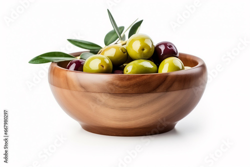 Bowl of green olives isolated on white background