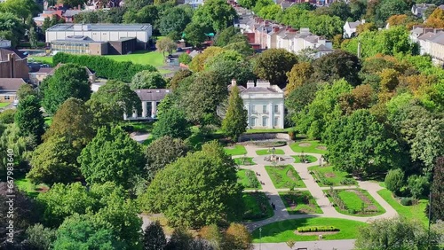 Aerial pullback reveals stunning garden landscape of Brodsworth Hall, Doncaster England photo