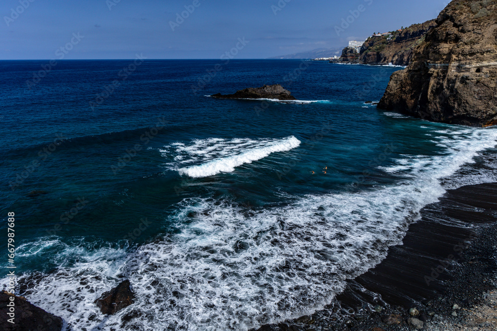 Rough waters of the Atlantic Ocean, dangerous waves for tourists in Tenerife