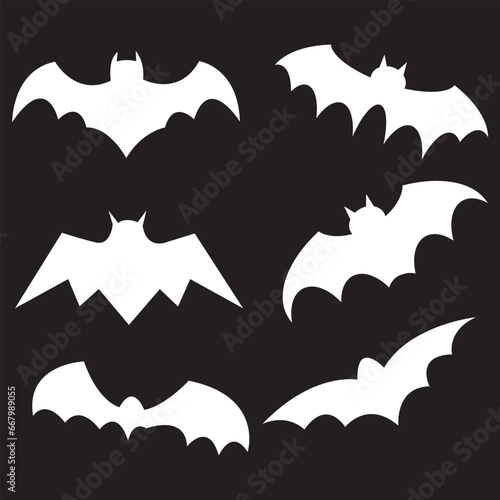 Black silhouettes of bats set on black background.