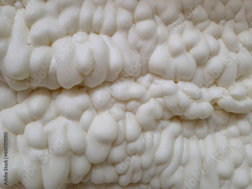 installation of polyurethane foam insulation with compressed gas goes through pipe through gun straight to the structure, it sticks like mush and swells like sponge. every crevice sealed, man, pipe 