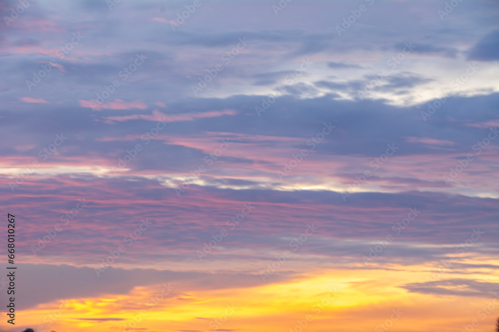 Obraz premium Colorful sky during sunrise, with colorful clouds.