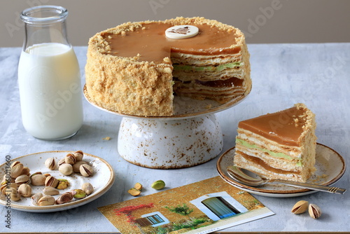 Napoleon birthday cake with pistachios and caramel