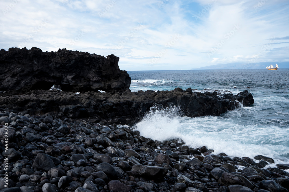 Stone coast of Tenerife, ocean, waves in Tenerife, stone beaches of Tenerife