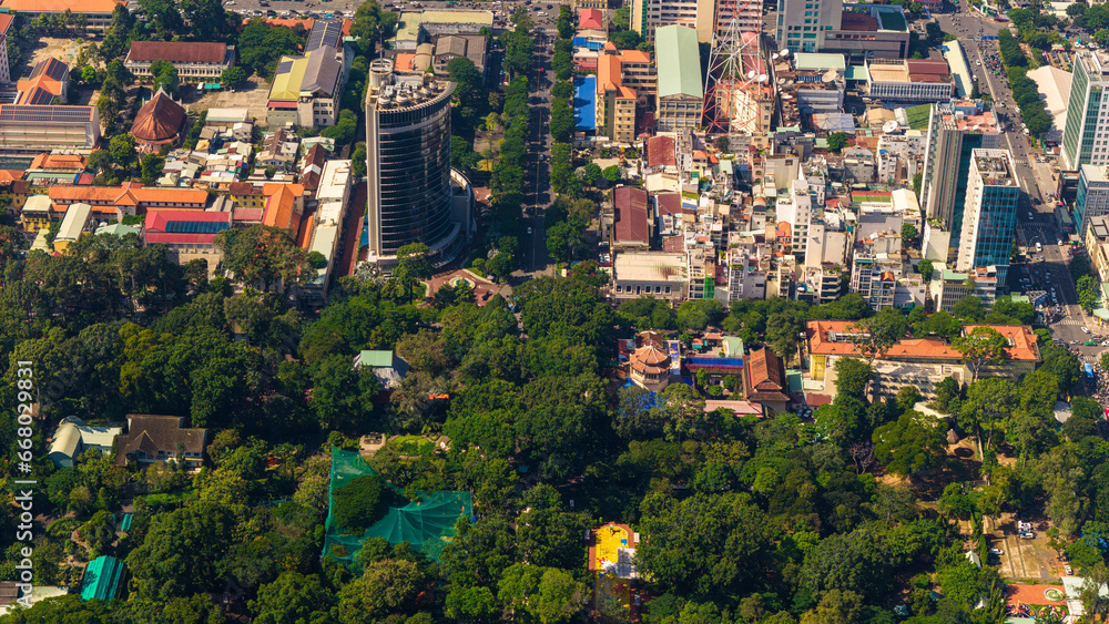 Naklejka premium Aerial view of Ho Chi Minh City skyline and skyscrapers in center of heart business at Ho Chi Minh City downtown.