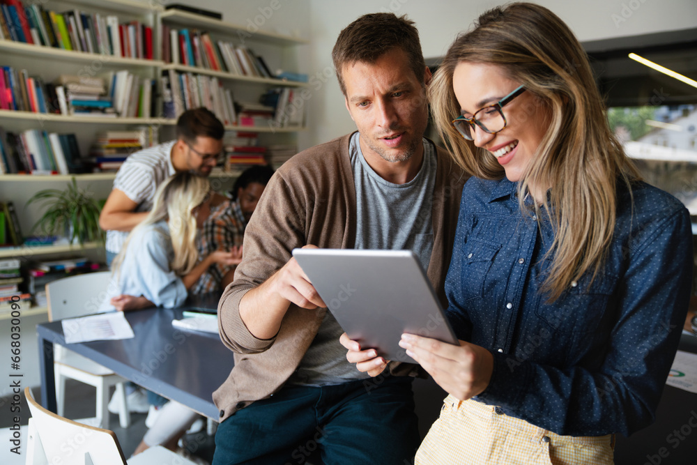 Programmers cooperating at IT company developing apps. People business work office concept Programmers cooperating at IT company developing apps. People business work office concept