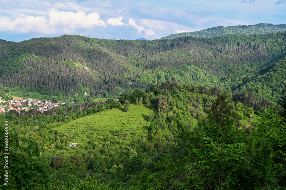 View of summer village on mountain valley.