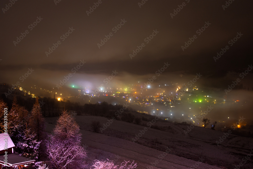 Winter landscape of Volovets town in New year's night in Ukraine
