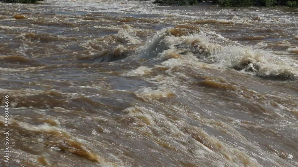 flooding very strong raging river strong current flooding very strong raging river strong current