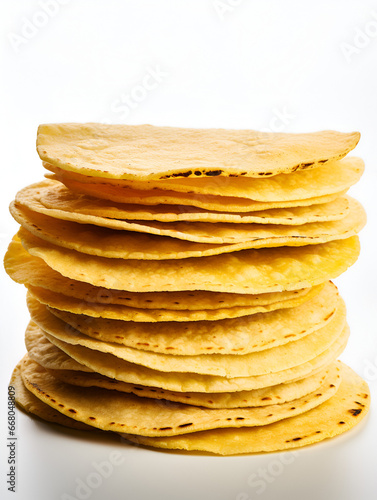 A stock of delicious corn tortillas isolated on white background  photo