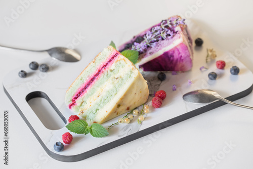berry  desserts on  marble board on white background