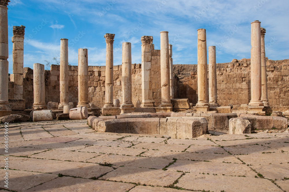 The Roman City of Gerasa (Jerash, Jordan) is ancient city. Macellum food market was built at end of 2nd century. Paved courtyard in shape of Greek cross with fountain in center.