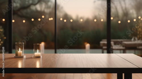 Wooden table with burning candles in modern cafe  closeup. Space for text.