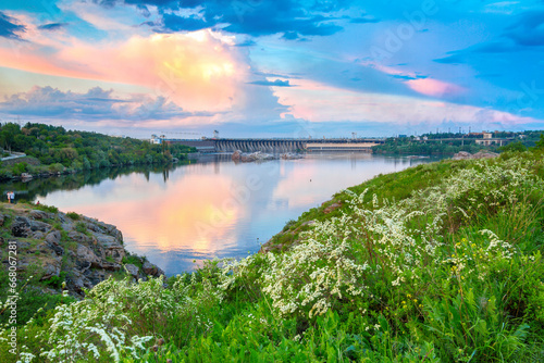 View of Dnieper river and Dniproges hydroelectric dam from Khortytsia island, Zaporizhzhia, Ukraine photo
