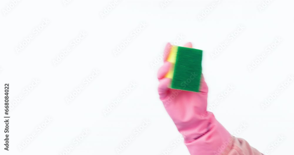 Hand, cleaning and person with sponge for hygiene, disinfect or housework isolated in a studio white background. Closeup, domestic work and janitor with sanitizer washing with glove for bacteria Hand, cleaning and person with sponge for hygiene, disinfect or housework isolated in a studio white background. Closeup, domestic work and janitor with sanitizer washing with glove for bacteria