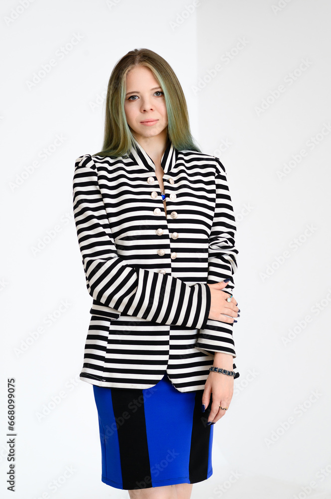 Stylish Young Woman with Striped Blazer and Pink Scarf on Light Background Stylish Young Woman with Striped Blazer and Pink Scarf on Light Background