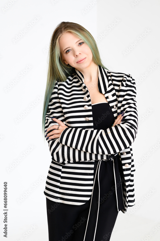 Stylish Young Woman with Striped Blazer and Pink Scarf on Light Background Stylish Young Woman with Striped Blazer and Pink Scarf on Light Background