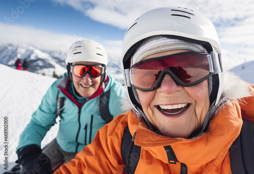 senior woman and man with ski goggles wearing ski clothing and warm hat skiing in snowy land content and happy