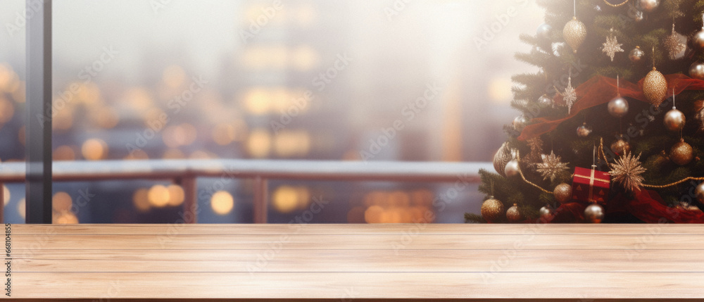 Empty wooden table with christmas tree and bokeh lights background.