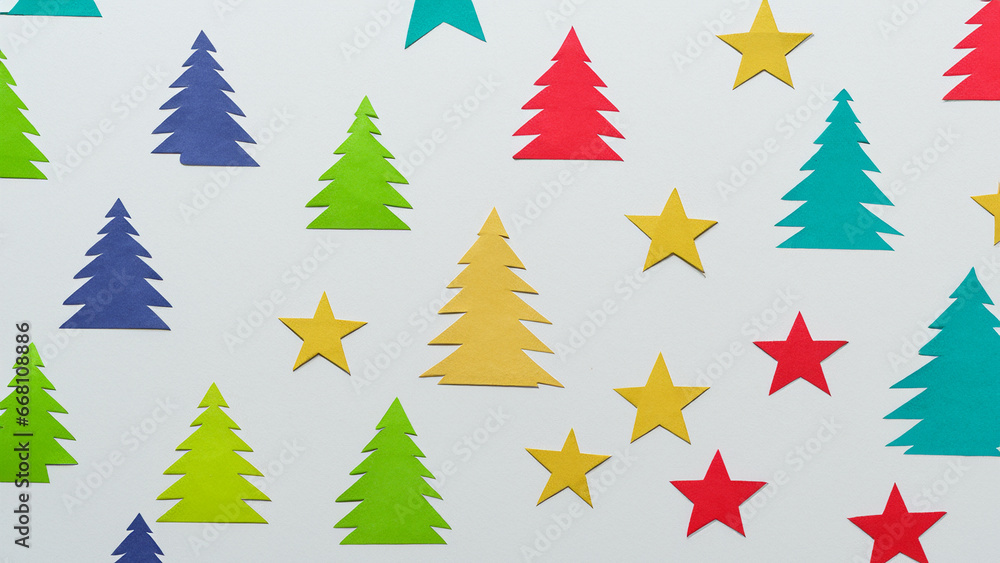 Obraz premium White background with paper texture and colorful and stylized Christmas trees and stars