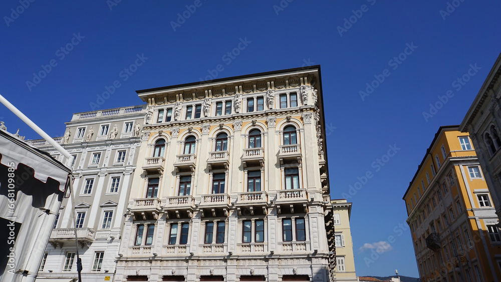 The streets of Trieste with the facades of old and colorful Mediterranean houses. Trieste, Italy