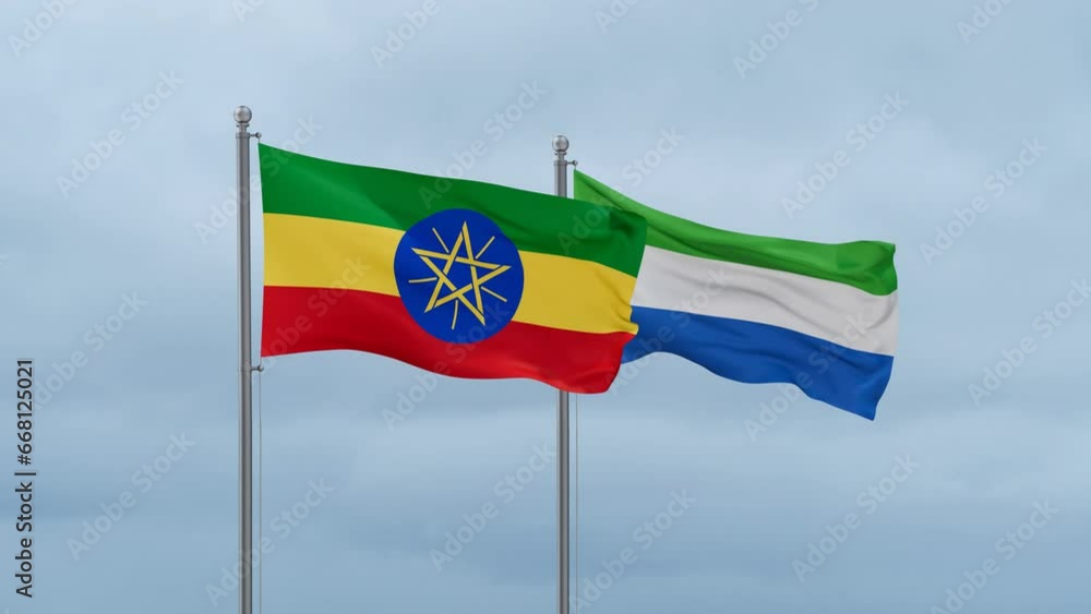 Sierra Leone or Salone and Ethiopia flag waving together on cloudy sky, endless seamless loop, two country cooperation concept Sierra Leone or Salone and Ethiopia flag waving together on cloudy sky, endless seamless loop, two country cooperation concept