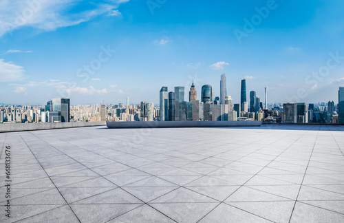 Empty square floor with city skyline in Guangzhou, Guangdong Province, China. 