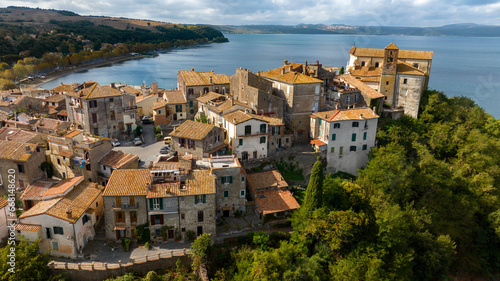 Aerial view of the historic center of Anguillara, in the metropolitan city of Rome, Italy. The town is located on the shores of Lake Bracciano. photo