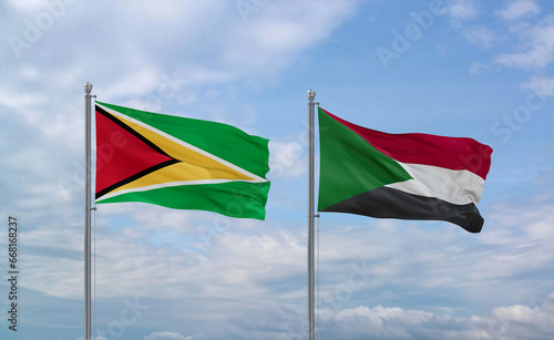 Sudan and Guyana flags, country relationship concept