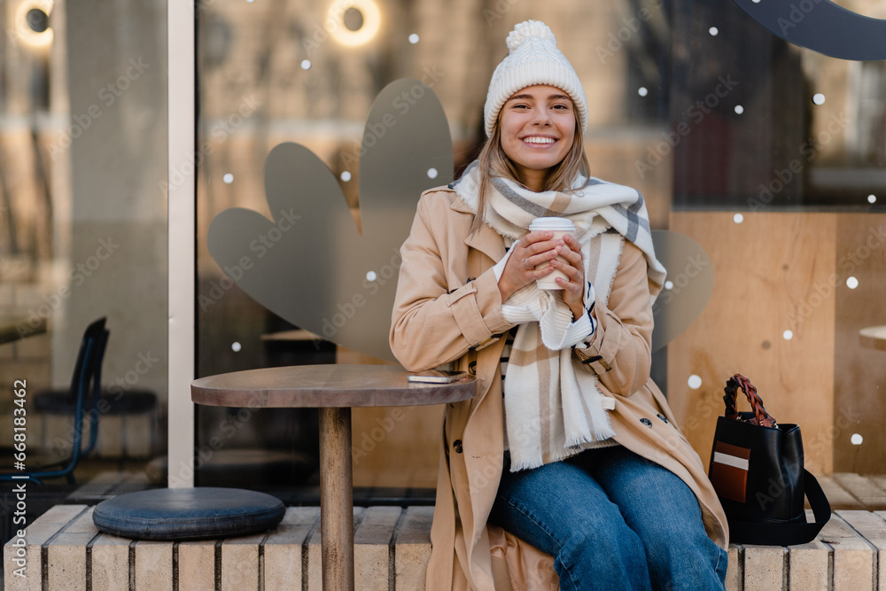 stylish woman walking in winter street