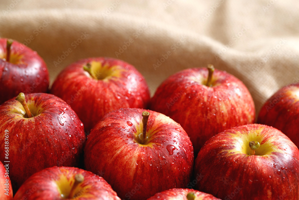 fresh red apples on the wooden floor fresh red apples on the wooden floor