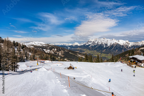 Schladming alpine ski resort with Dachstein Mountain on background, Keibling Alm area, Austria photo