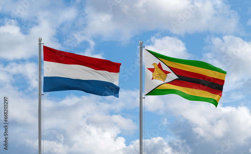 Zimbabwe and Luxembourg flags, country relationship concept