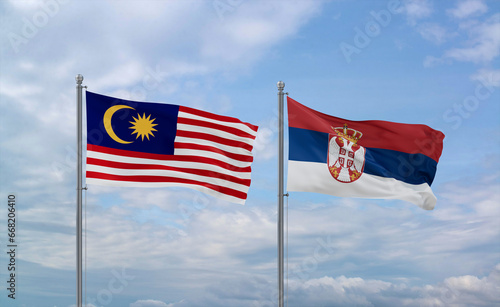 Serbia and Malaysia flags, country relationship concept
