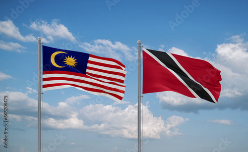 Trinidad and Tobago and Malaysia flags, country relationship concept