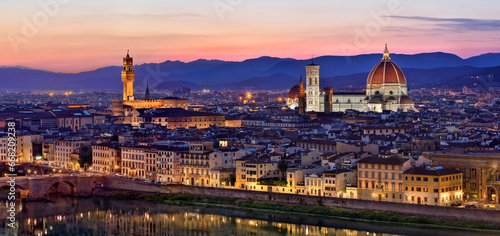 The Palazzo Vecchio and Cattedrale di Santa Maria del Fiore (The Duomo) and the city of Florence in Tuscany, Italy.
