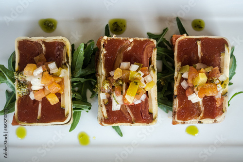Overhead view of three slices of a Courgette and tomato terrine