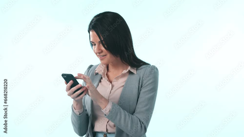 Business woman, phone and success in studio for winning, celebrate profit and bonus promotion on blue background. Happy worker, achievement and surprise with fist for mobile deal, reward and prize Business woman, phone and success in studio for winning, celebrate profit and bonus promotion on blue background. Happy worker, achievement and surprise with fist for mobile deal, reward and prize