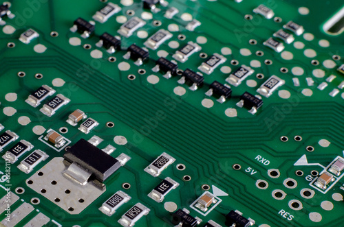 Electronic components on a board close-up © dimas830