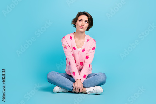 Full length body photo of pensive girlfriend guess her where husband sitting looking empty space decide isolated on blue color background